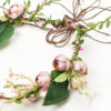 Couronne de fleurs cérémonie avec fleurs rose et liane